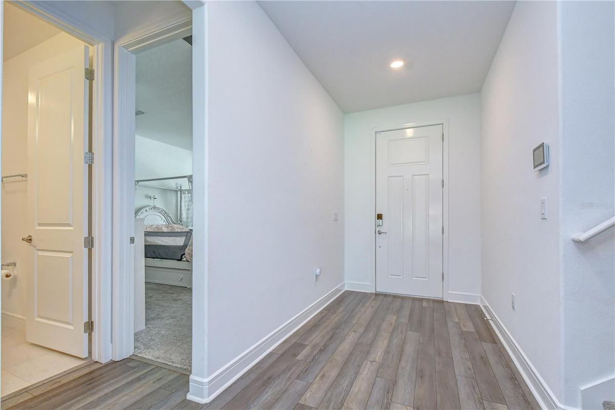 Bright, welcoming entry featuring soaring 8-foot interior doors.