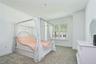 Private front bedroom ideal for guests or a home office.