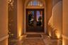 Welcoming Arched Entry at Dusk