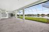 Covered Lanai, Screened Area with View, Aquarium Window and Large Sliders to Family Room - Also Start of Secondary Covered Lanai