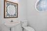 Half Bath by Den/4th Bedroom