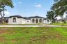 Circular Driveway with 4 Garages - 2 are Drive Thru