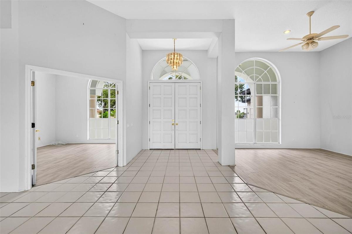 Entryway with Den/4th Bedroom on Left and Dining Room on Right