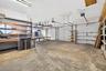4 Garages with 20' Ceiling - 2 Garages are Drive Thru - extra Work Area