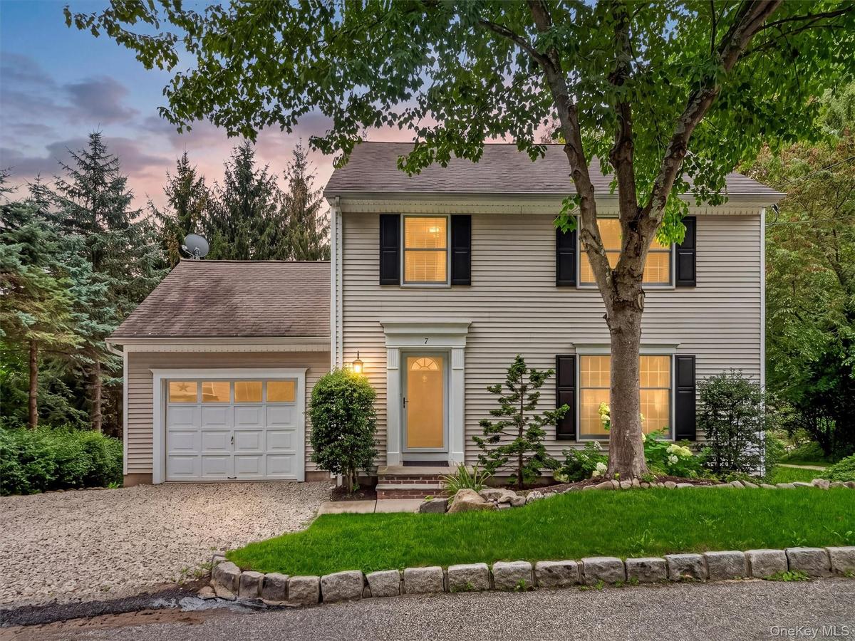 A warm welcome begins at the front door, where classic charm, thoughtful landscaping, and exceptional maintenance set the tone for the rest of the hom