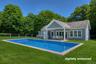 20x44 heated pool  with an 860 sf pool house