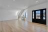 Bright and welcoming entry with clean architectural lines and natural light that immediately sets the tone of the home.
