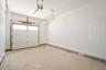 One car garage with entry into mud room.