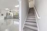 3-car Garage and stairs to Carriage House