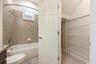 Guest Bathroom Main Floor with Storage under stairs