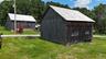 Showing barn on same side of home plus one across the road. Both in great shape!