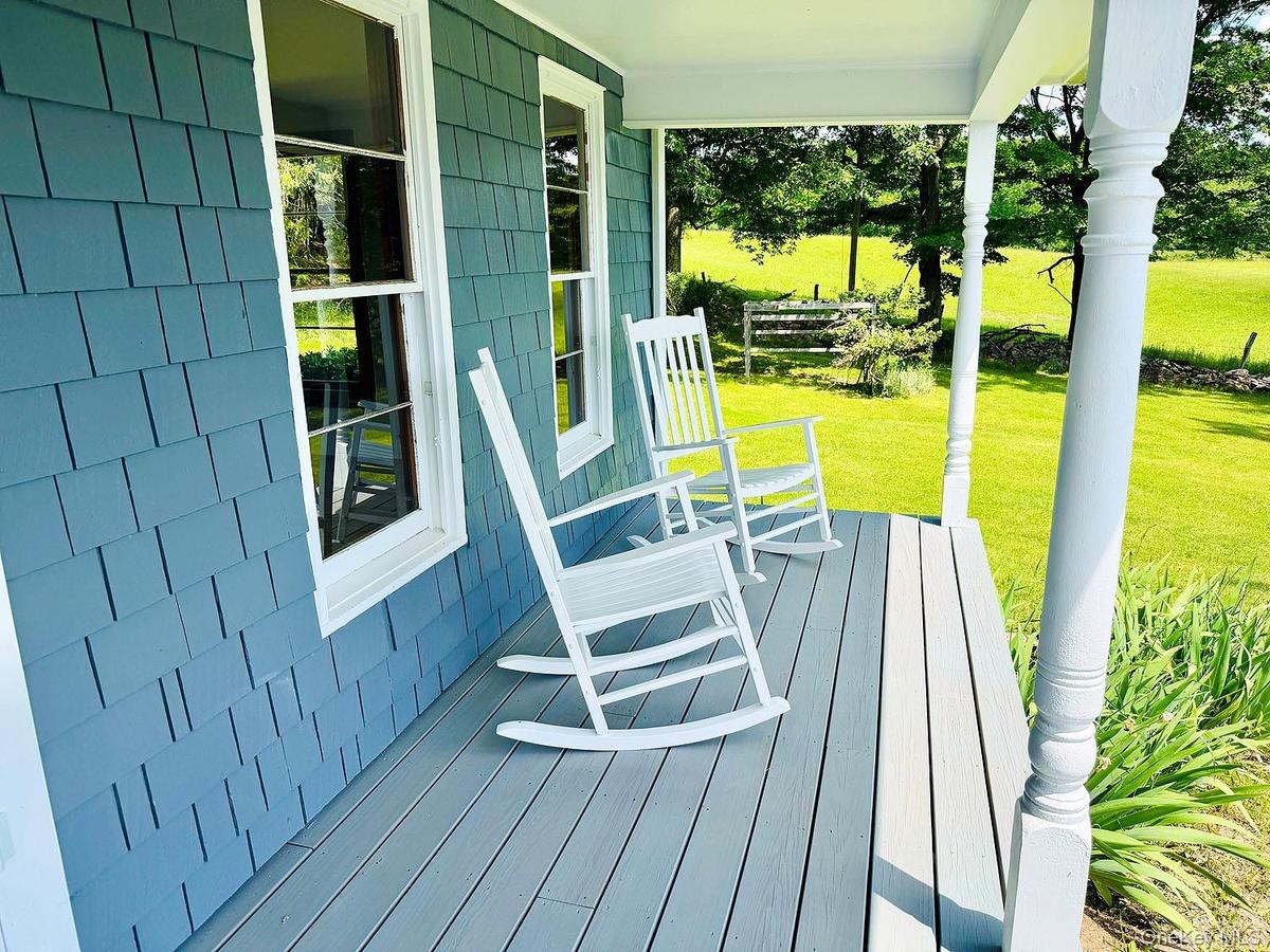 Love this covered porch!
