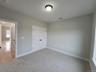 Generously sized and flooded with light, the bright and inviting, convenient first floor bedroom offers exceptional flexibility as a guest suite or sp