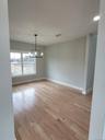 Dining space willed with natural light and positioned to accommodate gatherings large and small.