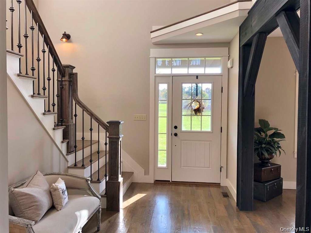 Filled with natural light and enhanced by elegant finishes, the entry foyer sets the tone for the warmth and character found throughout the home.