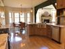 Designed for everyday living and entertaining, the kitchen flows effortlessly into the adjacent dining area.