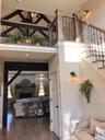 The welcoming foyer creates a memorable first impression, offering an inviting introduction to the home’s thoughtfully designed interior.