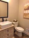 Designed for everyday convenience, the spacious bathroom combines style and functionality.