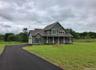 Nestled within a peaceful setting, the approach to the property offers a welcoming arrival experience while providing convenient access to nearby amen