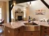 The spacious kitchen provided plenty of room for meal preparation while maintaining an open, welcoming feel.