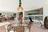 Reverse view of sun room looking back to entry to family room area.