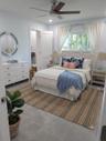 Virtually staged primary bedroom