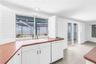 Kitchen sink overlooks pool