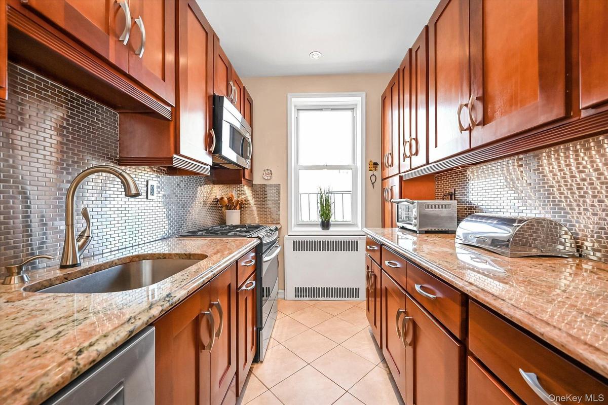 Kitchen cabinetry and granite counters