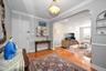 This entrance Foyer couples as a dining room, flowing naturally into the living room for entertaining