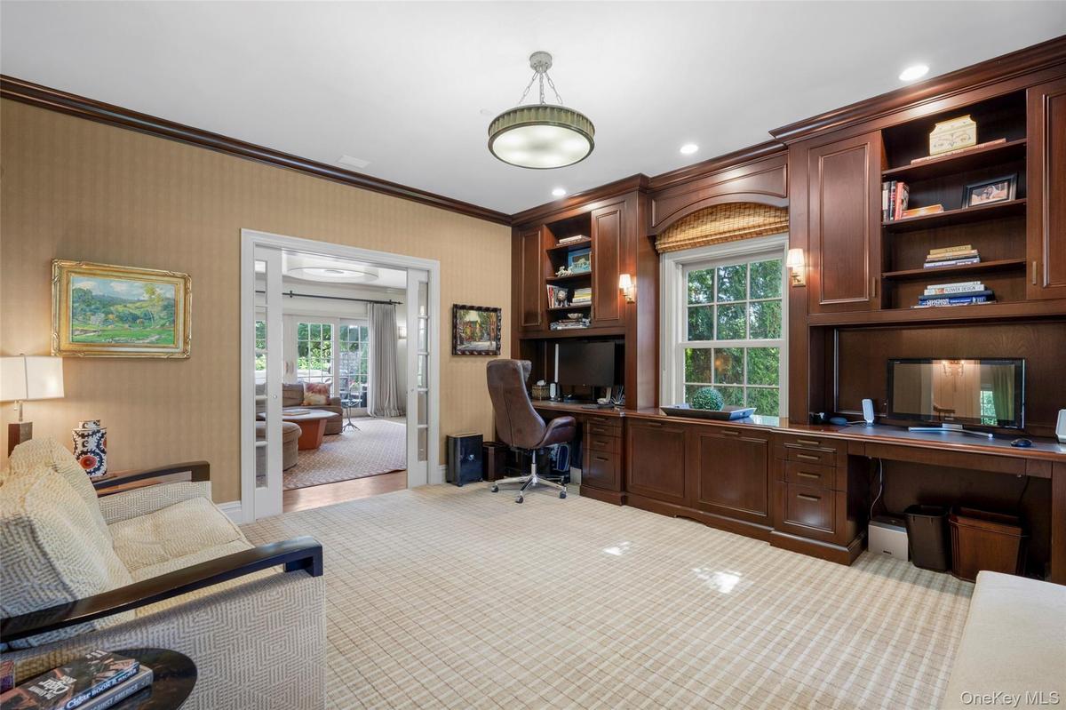 Custom built-in office cabinetry with 2 integrated desk spaces
