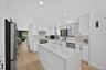 Kitchen opens to Family Room
