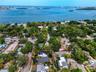 Location close to beaches and lower risk X Flood Zone (low risk per FEMA).