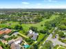 Aerial View of House Facing Golf Course