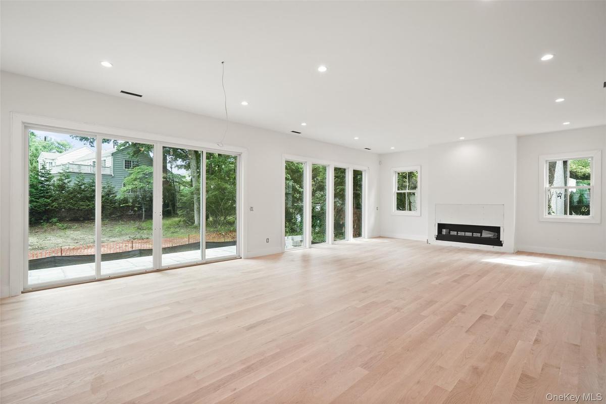 Great room with floor to ceiling windows
