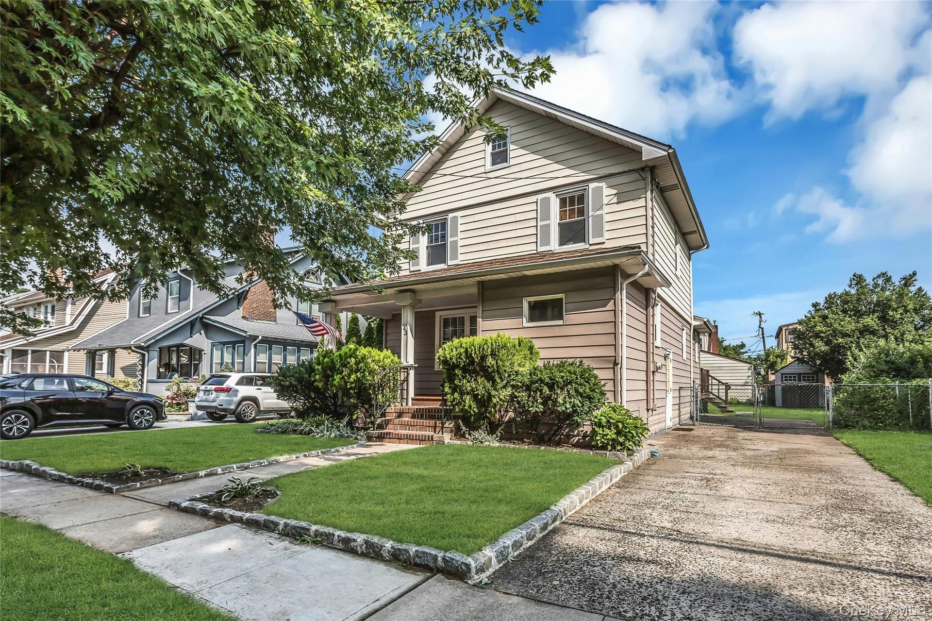 Front view with driveway