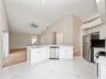 Kitchen to family room area and eating area