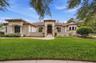 Exceptional custom estate by John C. Fowke in gated FishHawk village.