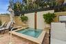 A relaxing spa on the pool deck