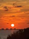 Imagine witnessing this orange sunset over Sarasota Bay from your balcony!