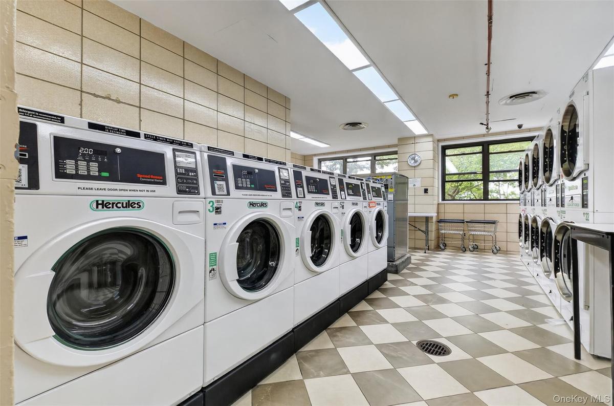 On-site laundry room with multiple machines for convenience