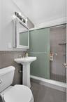 Primary full bathroom with show stall