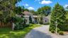 Privately nestled on 1.13 acres