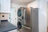 Kitchen with washer & dryer looking into the bathroom