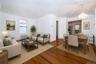 virtually staged.Living room/with dining area