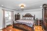 Oversized Primary Bedroom features a custom double closet a well as a third closet