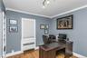 Bedroom located on the main floor or use for a Home Office or a Den complete with built-in bookshelves and window seat
