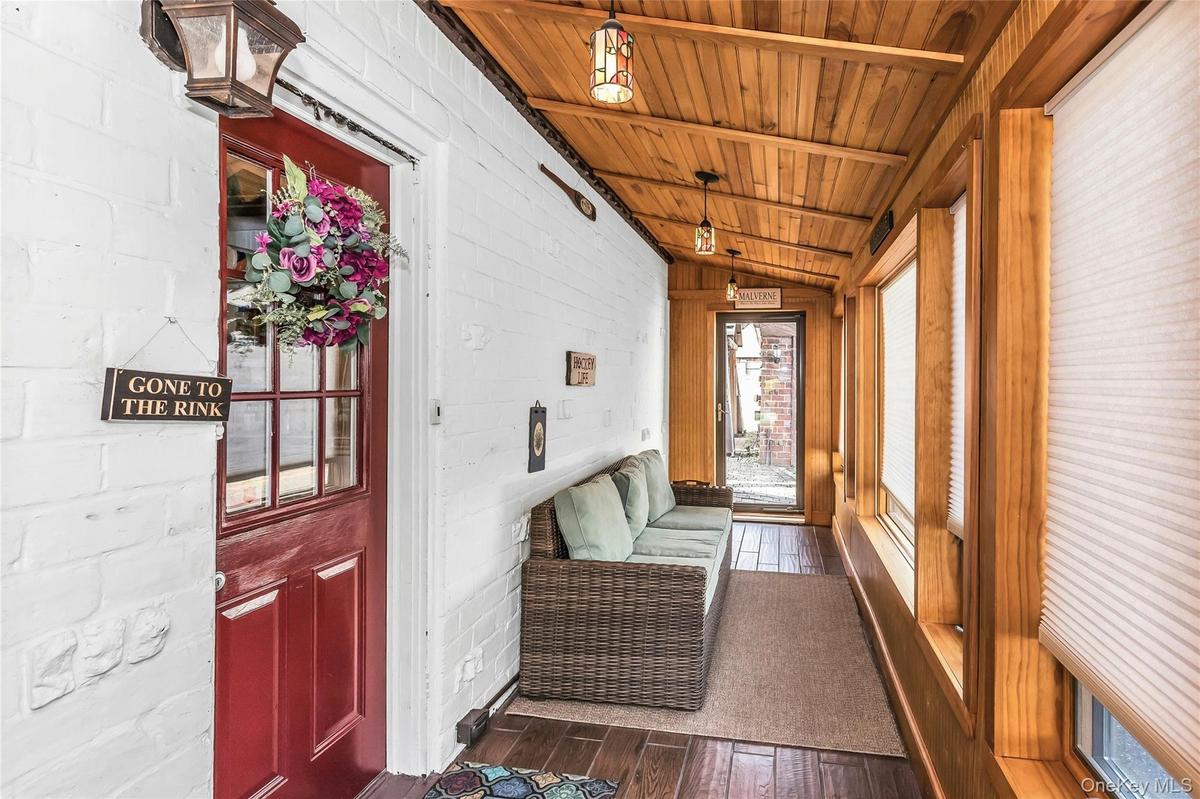 Beautiful Sun Room off the kitchen with access to the Backyard patio
