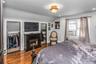 Oversized Primary Bedroom features a custom double closet a well as a third closet