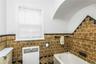 Classicly designed Bathroom with separate shower and tub features