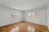 Another view of the primary bedroom